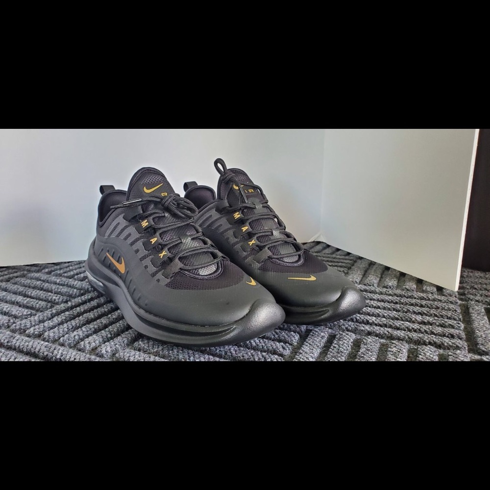 Women’s Nike Air Max Axis black and gold size 10
